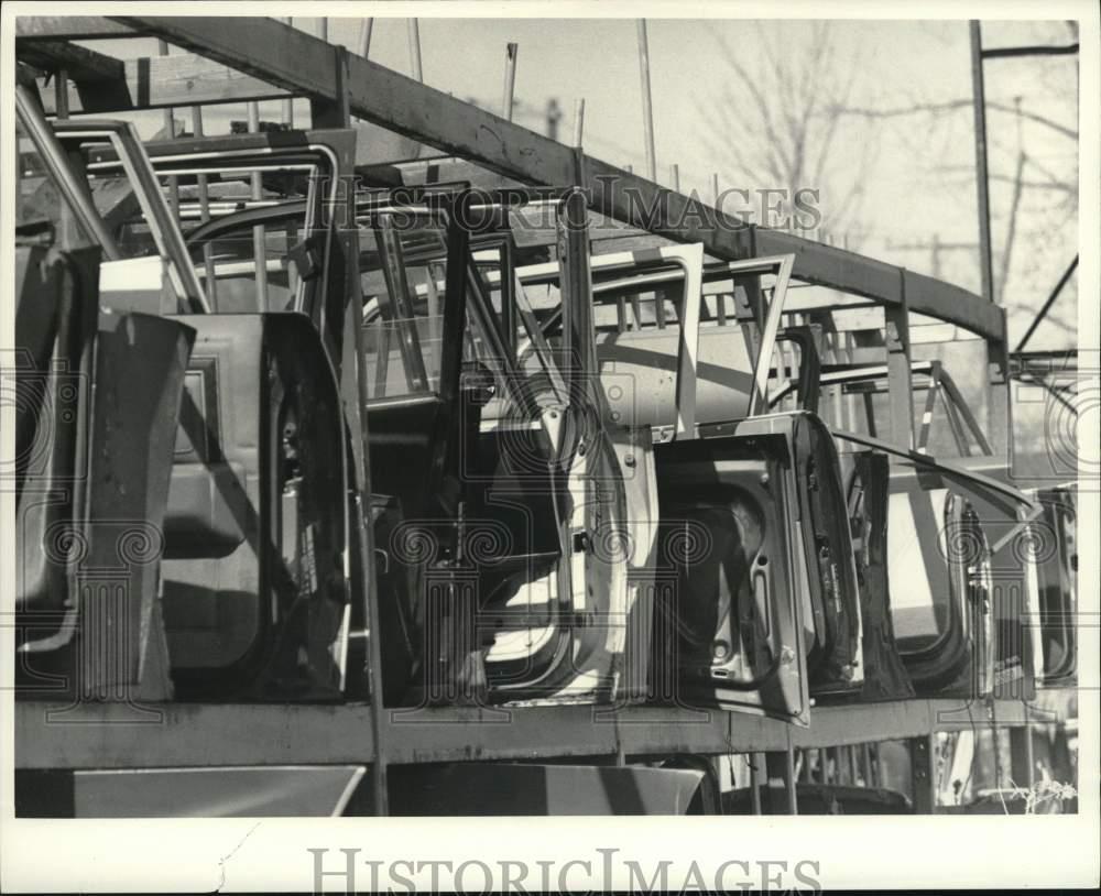 1987 Press Photo Car Doors on Racks at A& P Auto Parts in ...