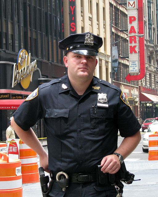 NYPD officer in Times Square after helping tourists with directions ...