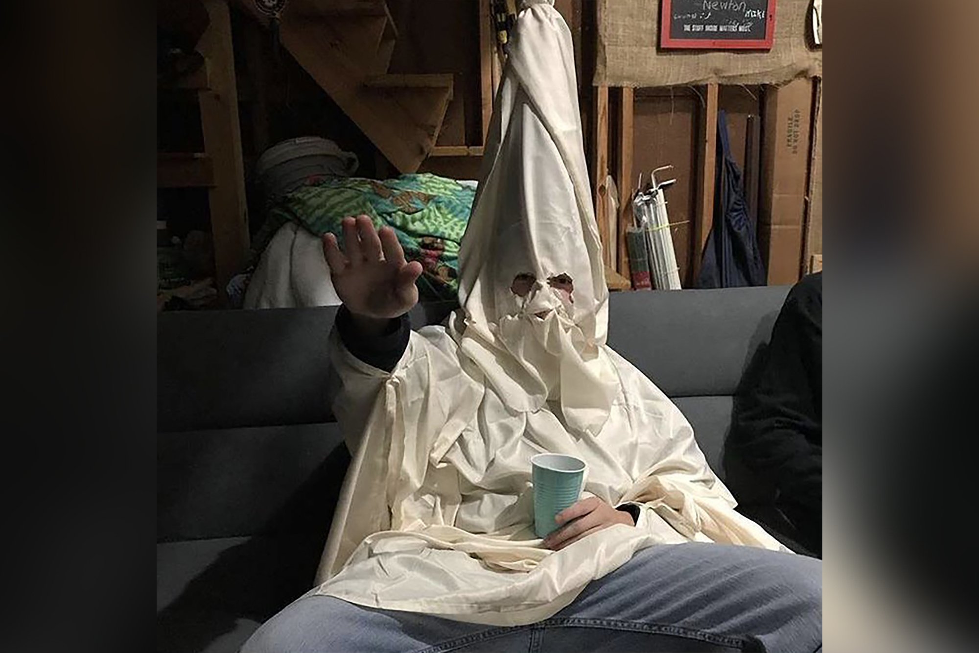 School investigates photos of teens in KKK robes